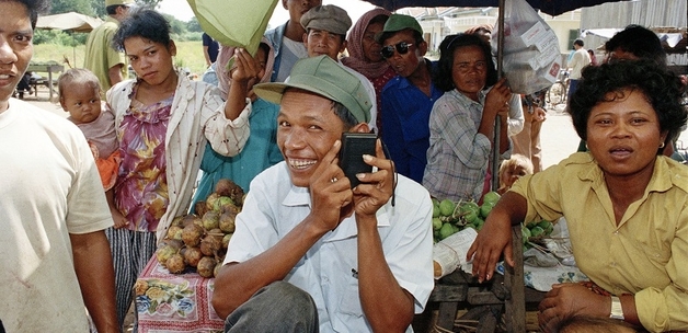 UN Photo/Pernaca Sudhakaran: A Cambodian listening to a radio donated by a Japanese non-governmental organization.1992 Kompong Speu, Cambodia
